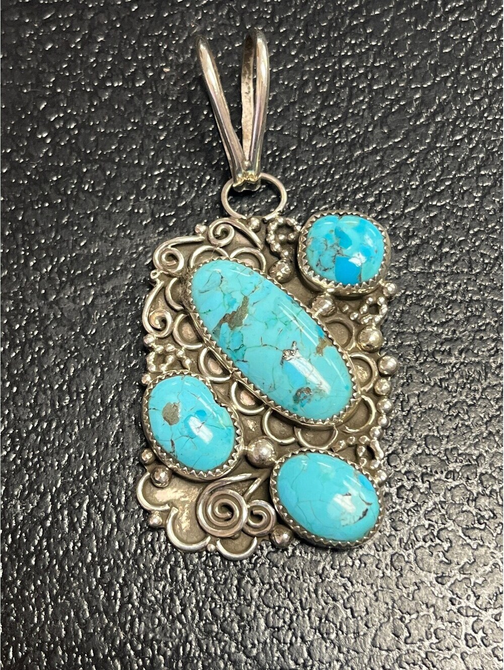 Native American Navajo jewelry handmade sterling silver turquoise pendant